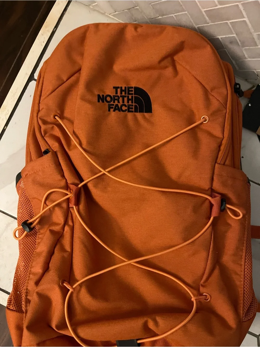 The North Face bold orange
